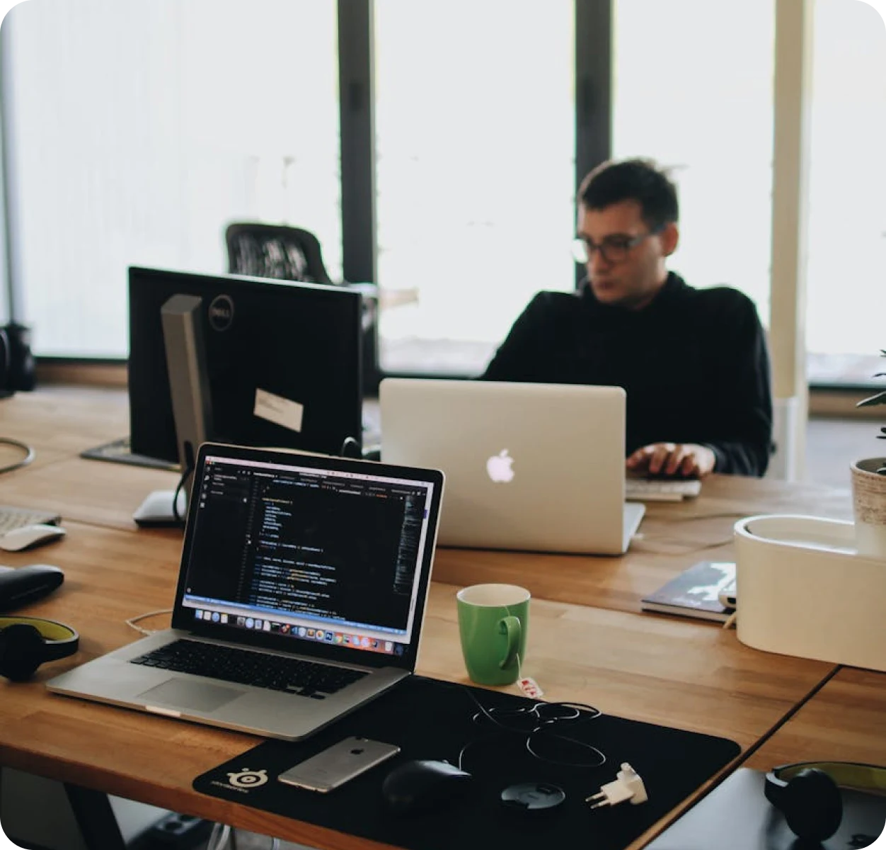 Professional working with city view